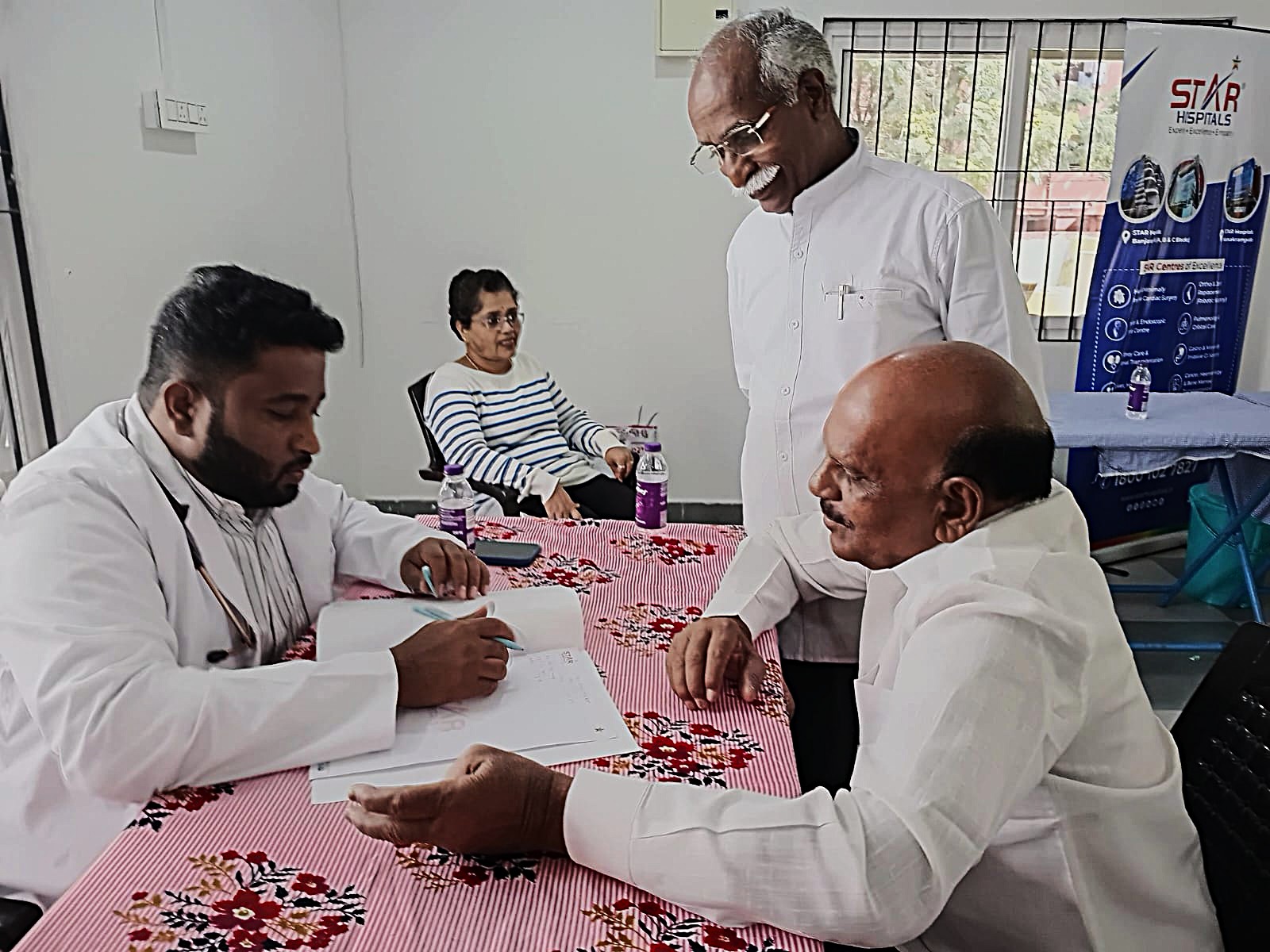 14 Physician consultation at camp.jpeg